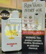 Ripe Vapes Ivory 40K vape device in Watermelon Ice flavor, showcasing its red LED light, dual mesh coil, and 15W/45W power modes.